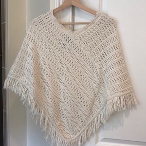 Cream Poncho with tassels